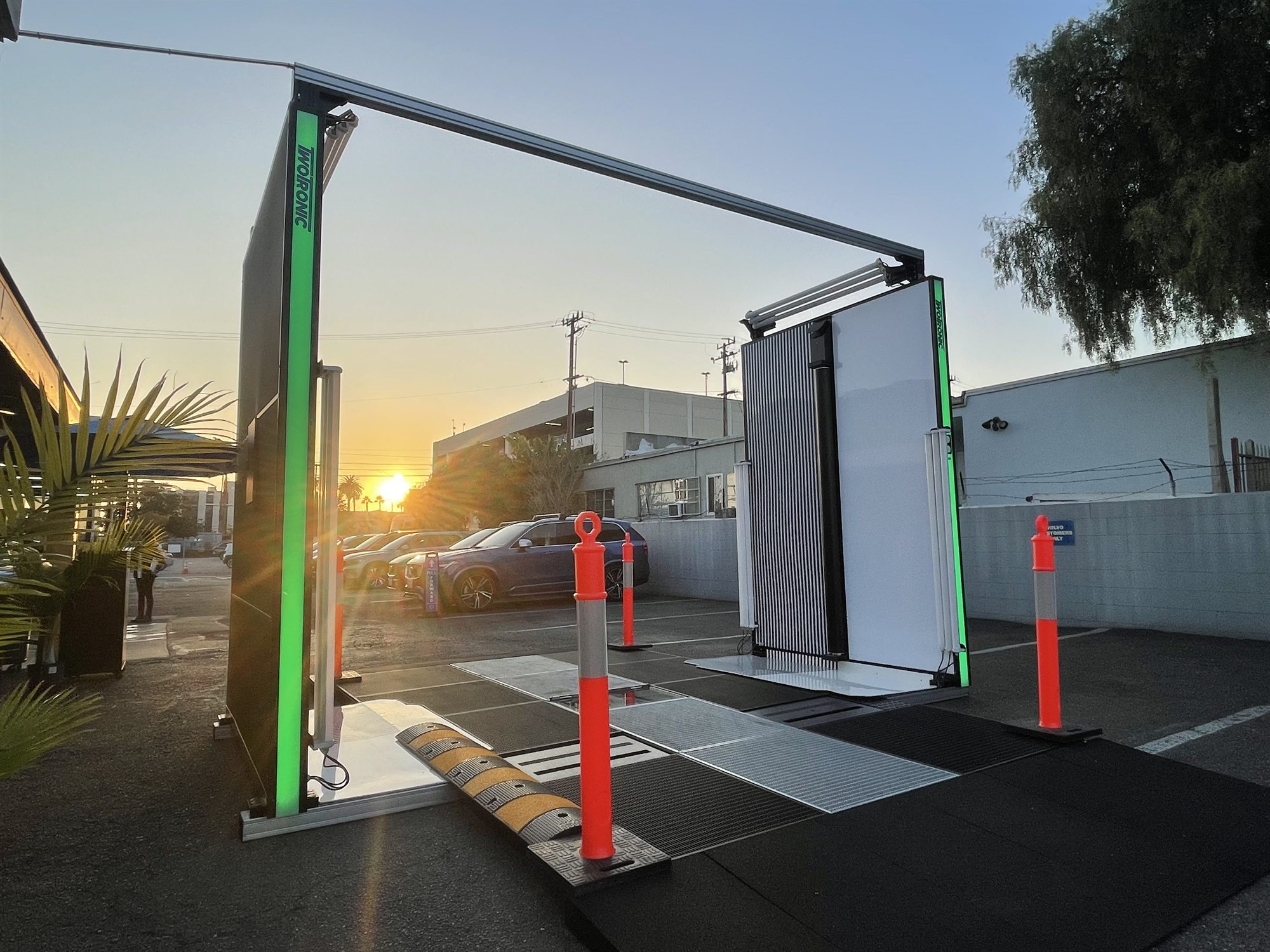 TwoTronic scanning gate running outdoors on a dealership lot in California at sunset