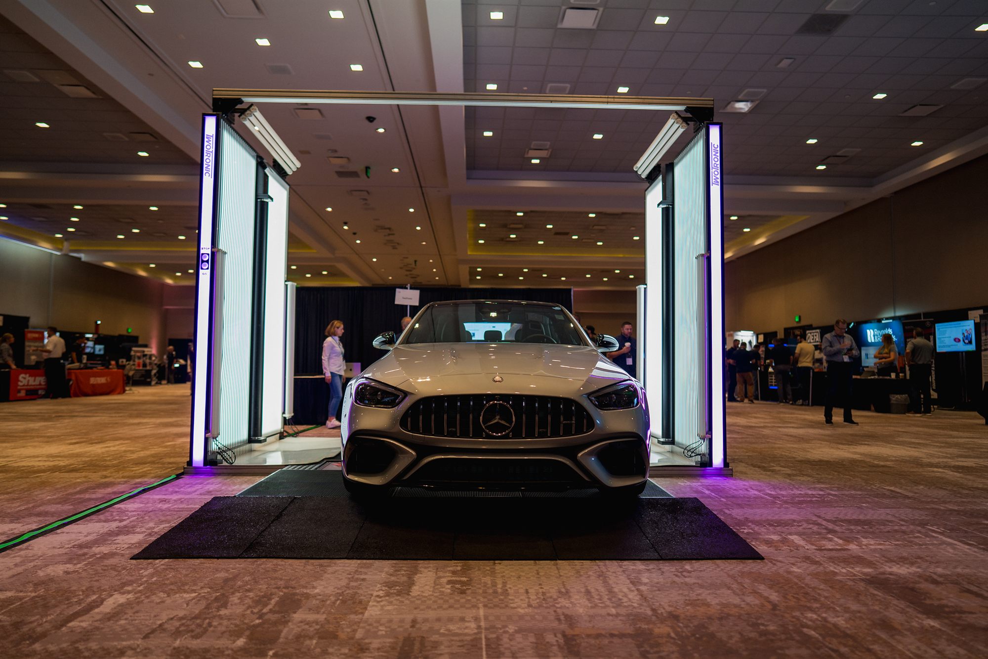 Luxury sedan driving through the XVD scanning gate