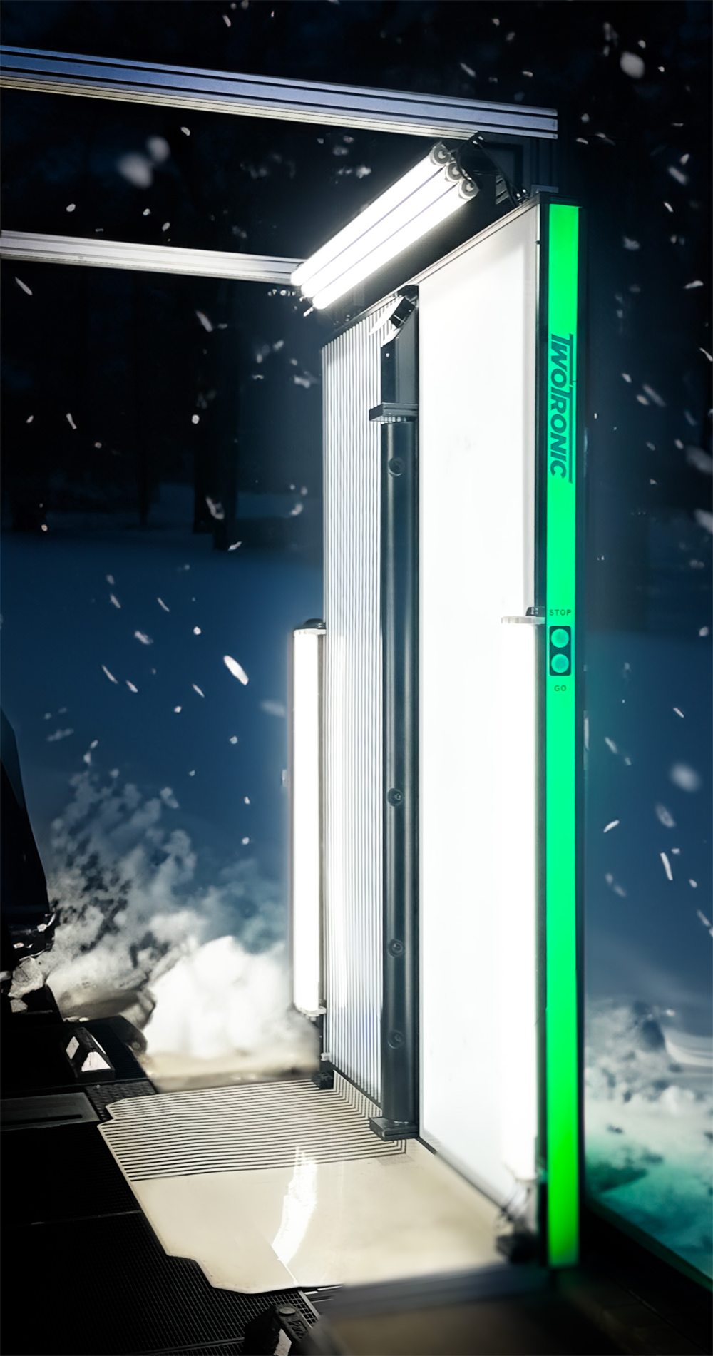 Scanner gate operating outdoors during heavy snowfall at night