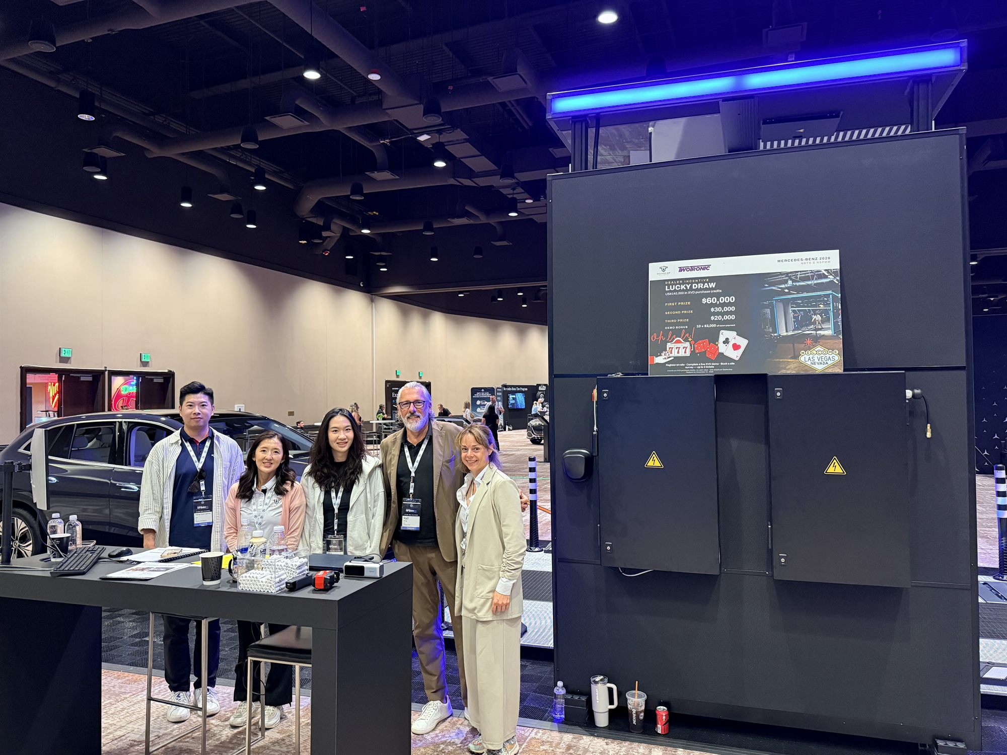 The RhinoCap and TwoTronic team at the stand beside the scanner control cabinet